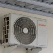 An air conditioning unit mounted on a wall