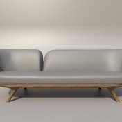 A grey sofa listing shown without a paid badge